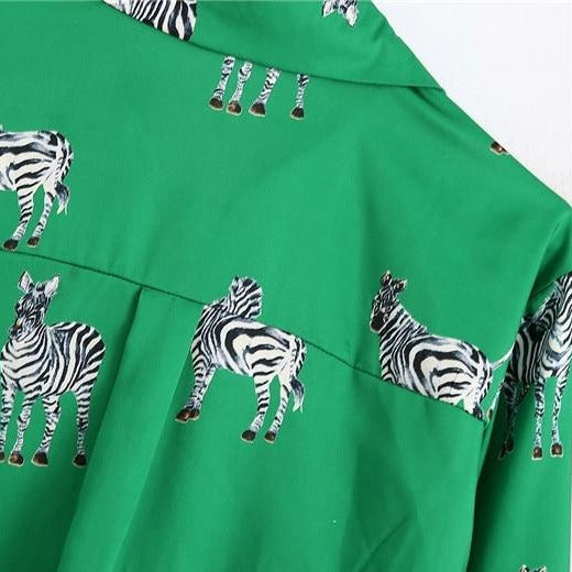 Elegancka satynowa bluzka damska z zebrami