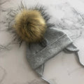 Nięmowlęca czapka zimowa z pomponem wiązana