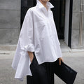 Biała asymetryczna stylowa koszula damska