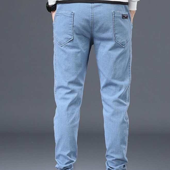 Męskie stylowe spodnie dżinsowe z gumką na dole
